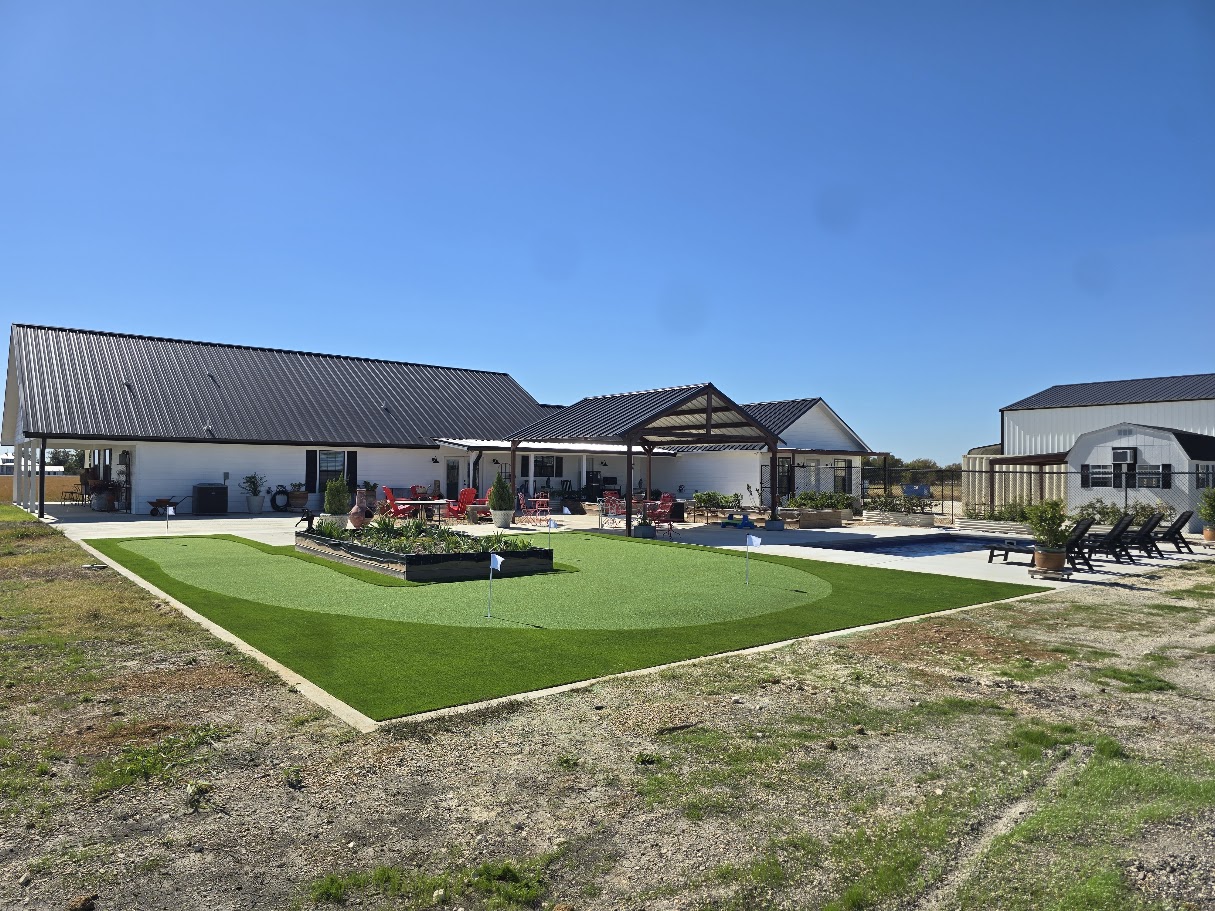 Modern Infinity Pool with Travertine Deck